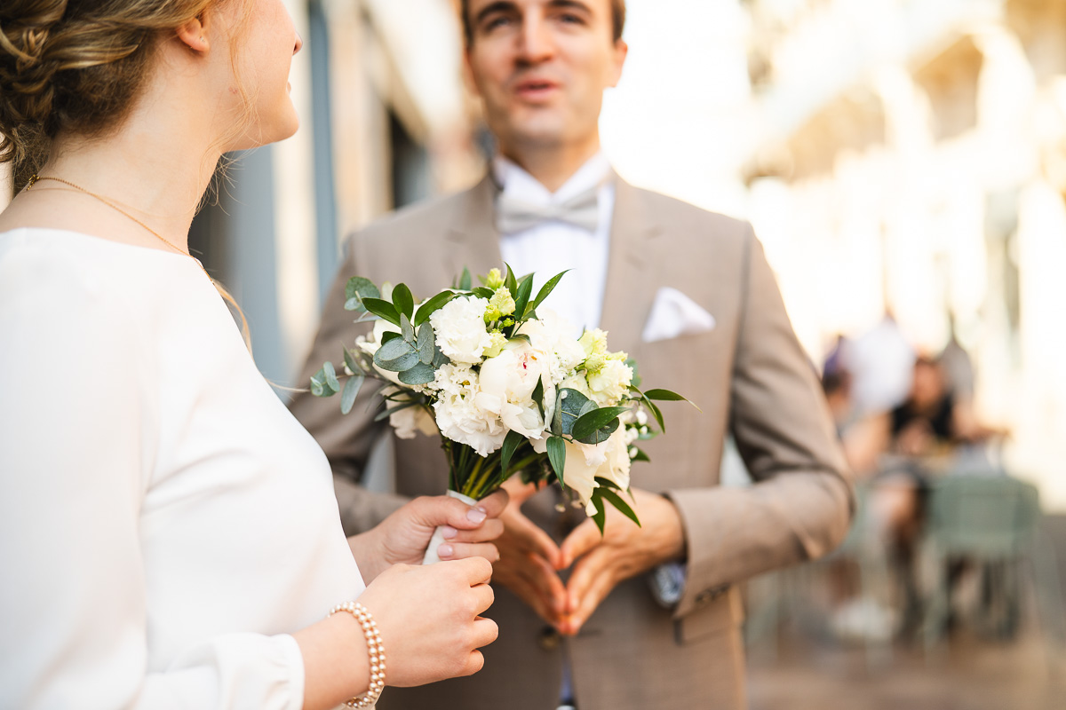The couple walking through the streets of Toulouse before the ceremony at the Capitole