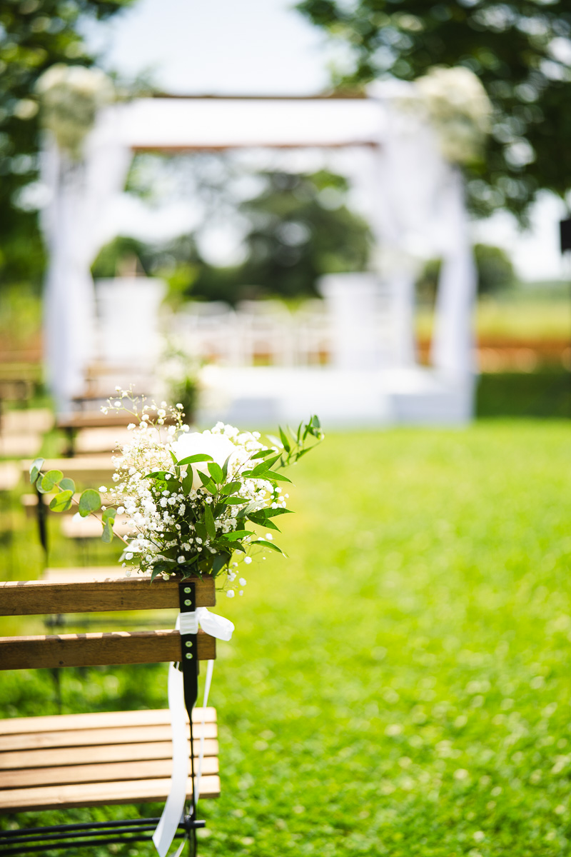 Bridal bouquet placed on a chair at the Halte en Cocagne estate in the Tarn
