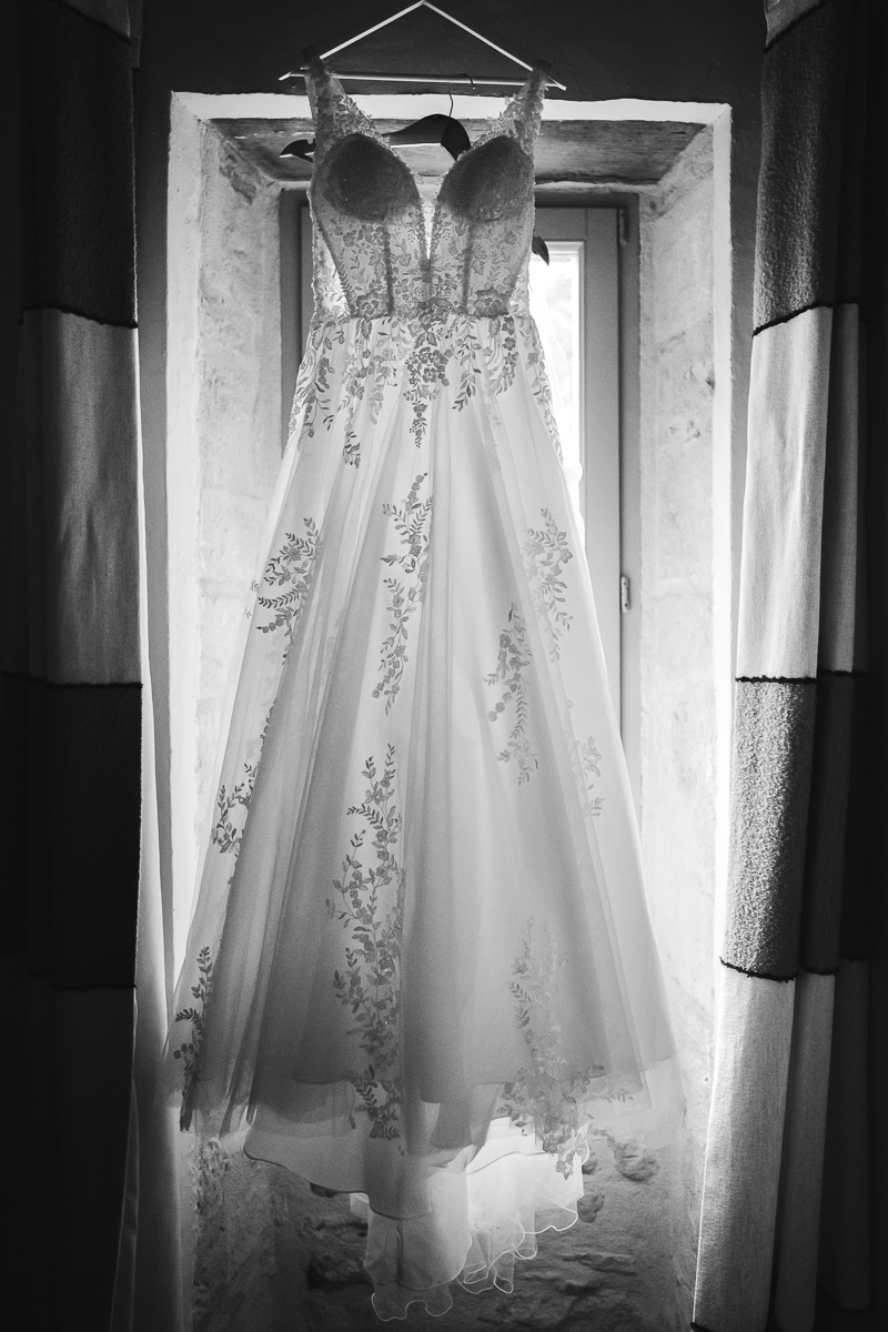 Detail of the wedding dress, preparations at Halte en Cocagne in the Tarn