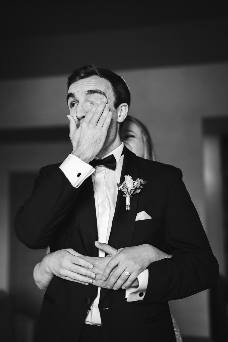 Emotional moment during the black and white first look, wedding in the Tarn