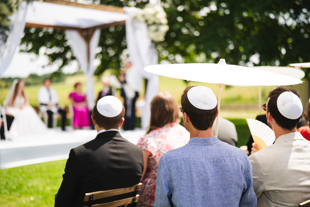 The bride entering under the huppah at the Halte en Cocagne estate in the Tarn