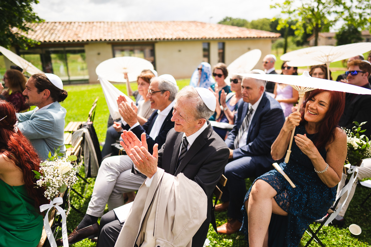 The groom breaking the glass at the end of the ceremony at Halte en Cocagne, Tarn