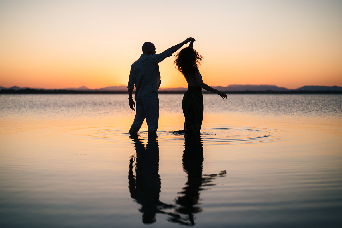 Couple in the water at sunset, Étang de Canet-Saint-Nazaire, near Perpignan