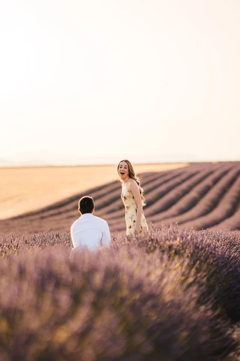 A woman's reaction the moment her partner proposes in the Valensole lavender fields