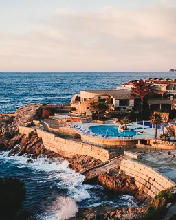 Sunrise view over the Mediterranean Sea and the hotel pool at Eden Roc on the Costa Brava