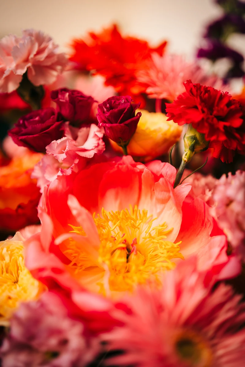 Close-up of red and orange flowers in a bouquet