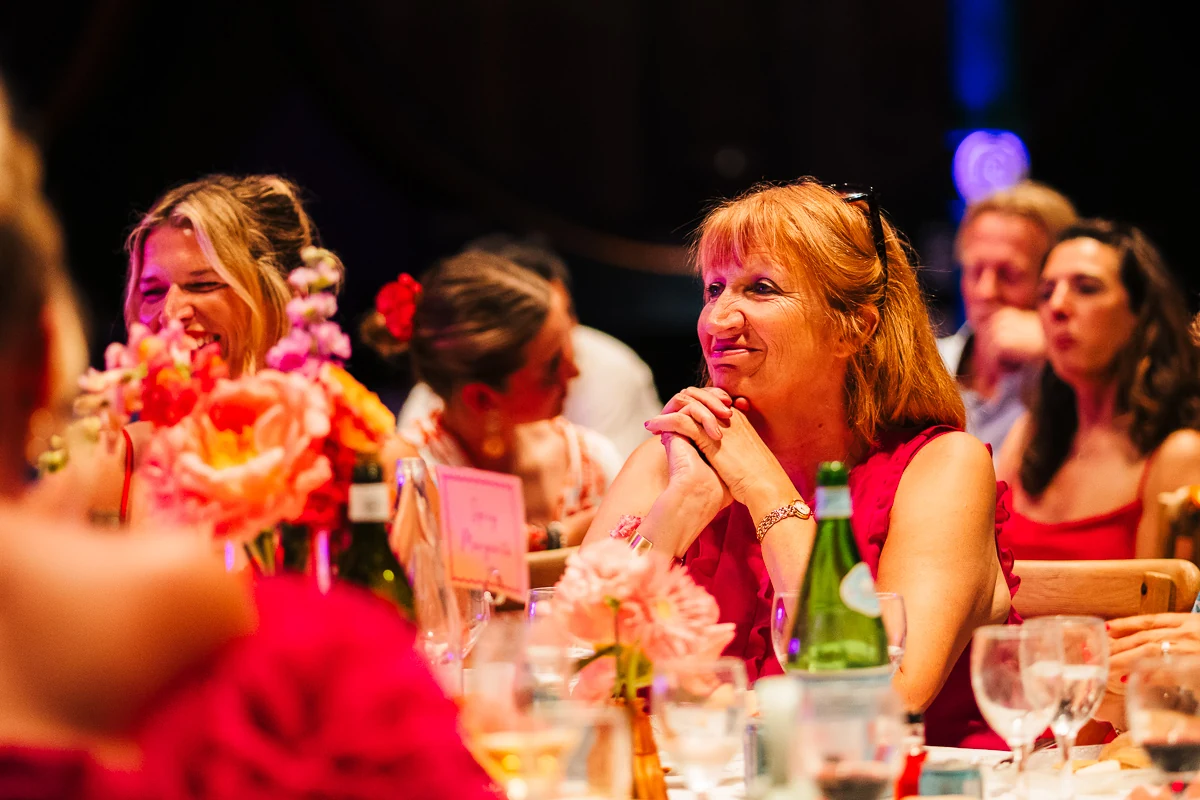 Guests listening to speeches at the dinner table