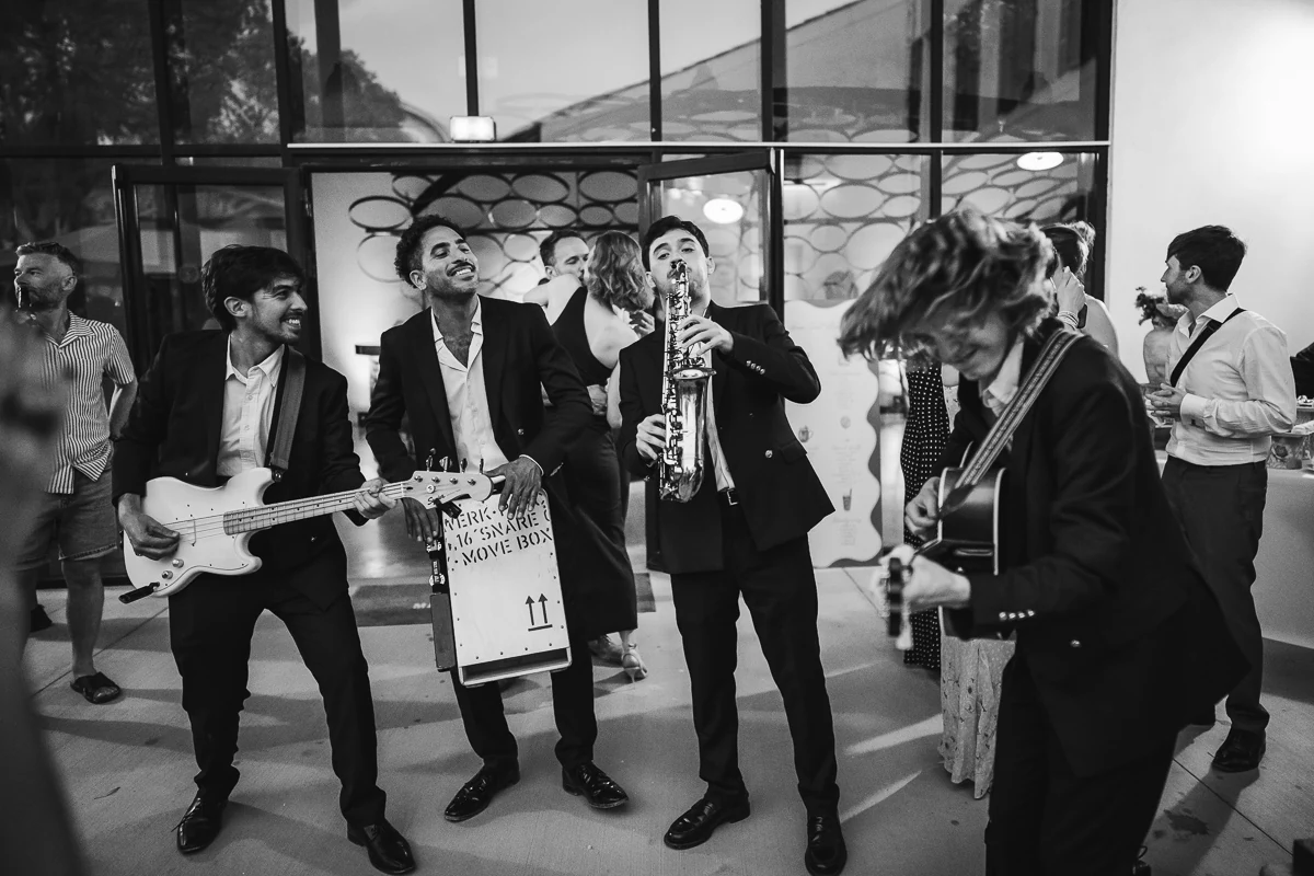 Live band performing with guitar and saxophone at the reception - The Gentlemen Riviera