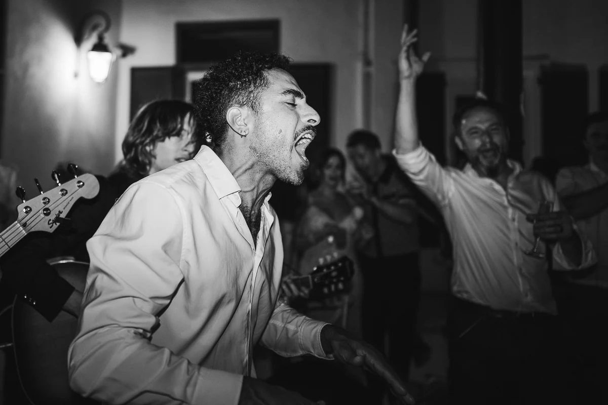 Black-and-white photo of a singer during the party