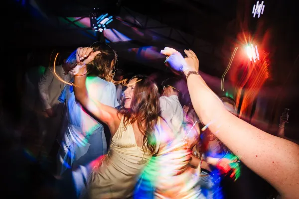 Wedding guest dancing and having fun on the dancefloor during the party